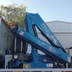 Image of Fassi F80 crane: a compact and versatile hydraulic truck-mounted crane designed for efficient lifting and maneuverability. Excellent Material Handling Equiptment