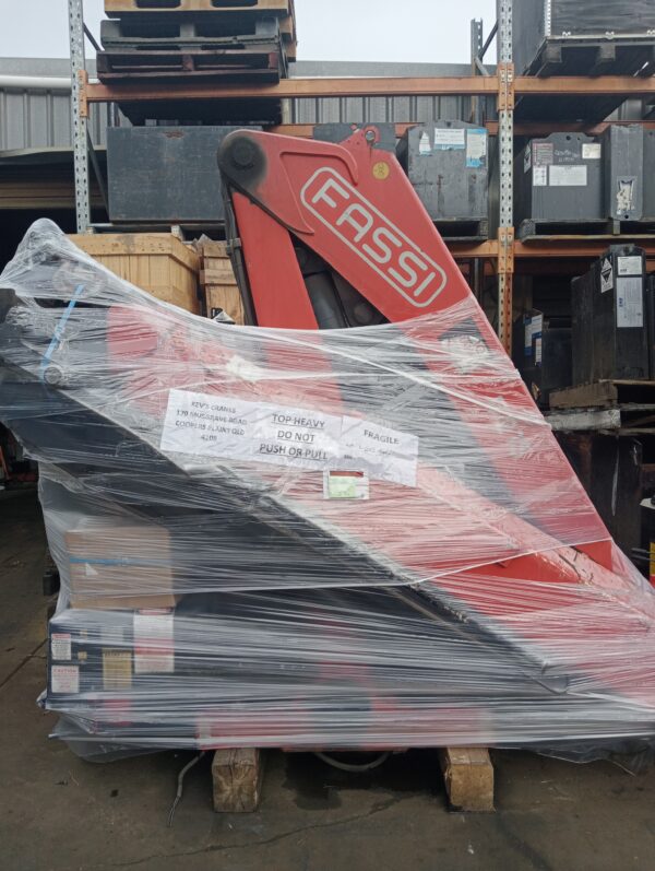 Used Fassi 215 Crane for sale with radio remote.